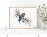 blue bird painting in a gold frame