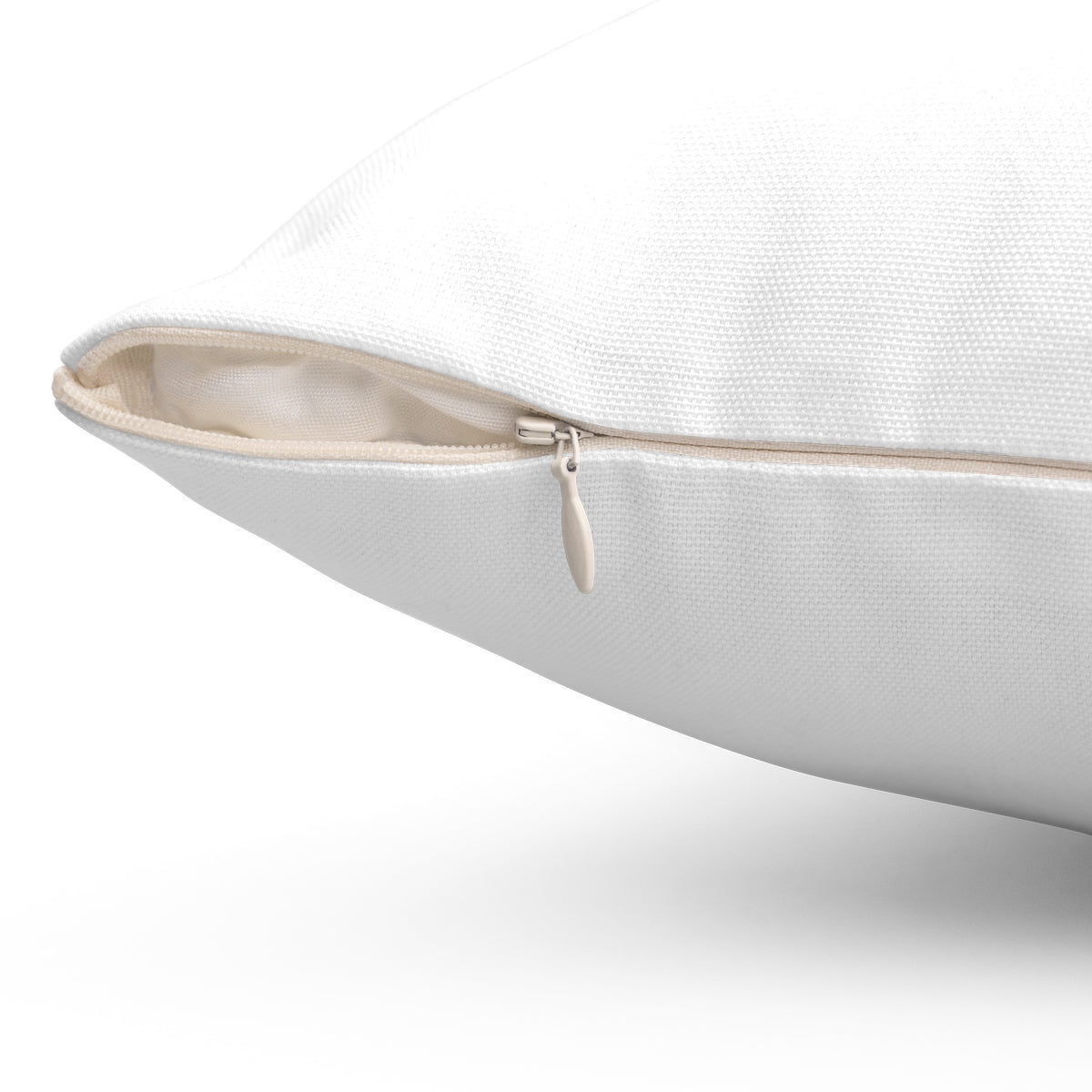 White accent throw pillow from the side