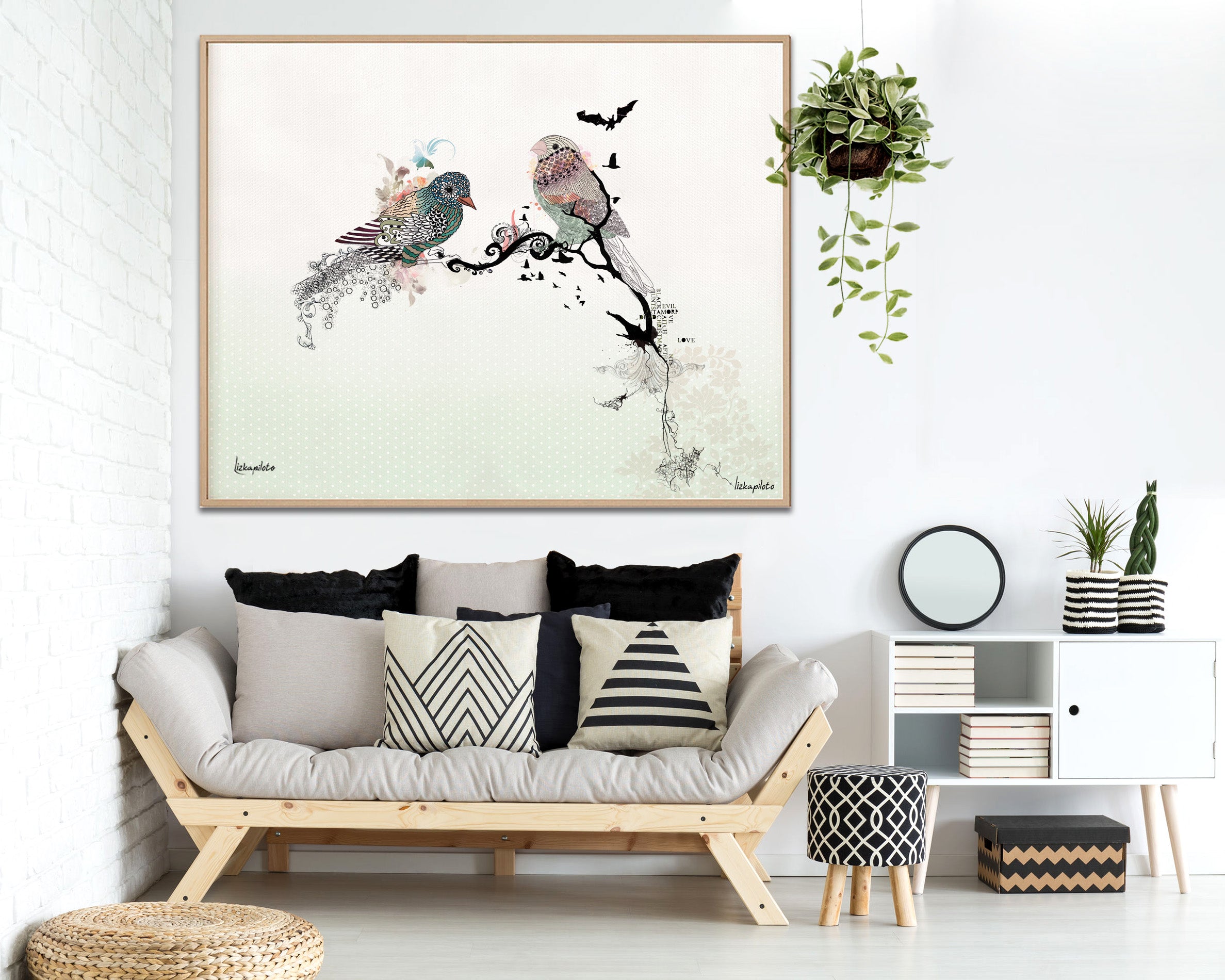 love bird art, hanged above modern sofa with pillows