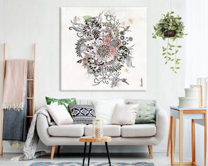 Large canvas with mandala painting in a modern living room above sofa with pillows
