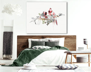red cardinal painting above bed in bedroom space