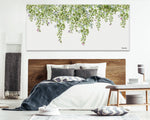 Green leaves watercolor painting on a panoramic canvas above the bed in bedroom space