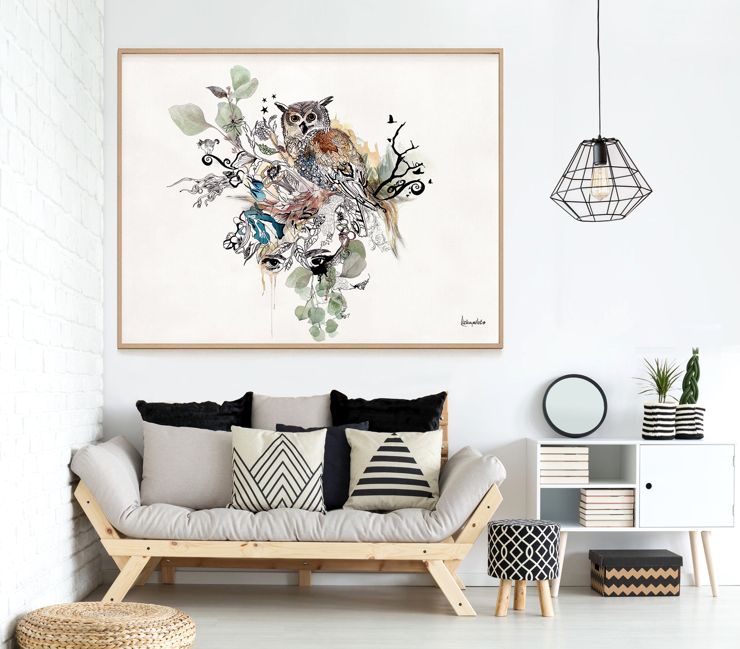 watercolor owl art, framed and hanged above sofa