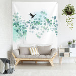 Turquoise wall tapestry, hanged on a white wall above sofa